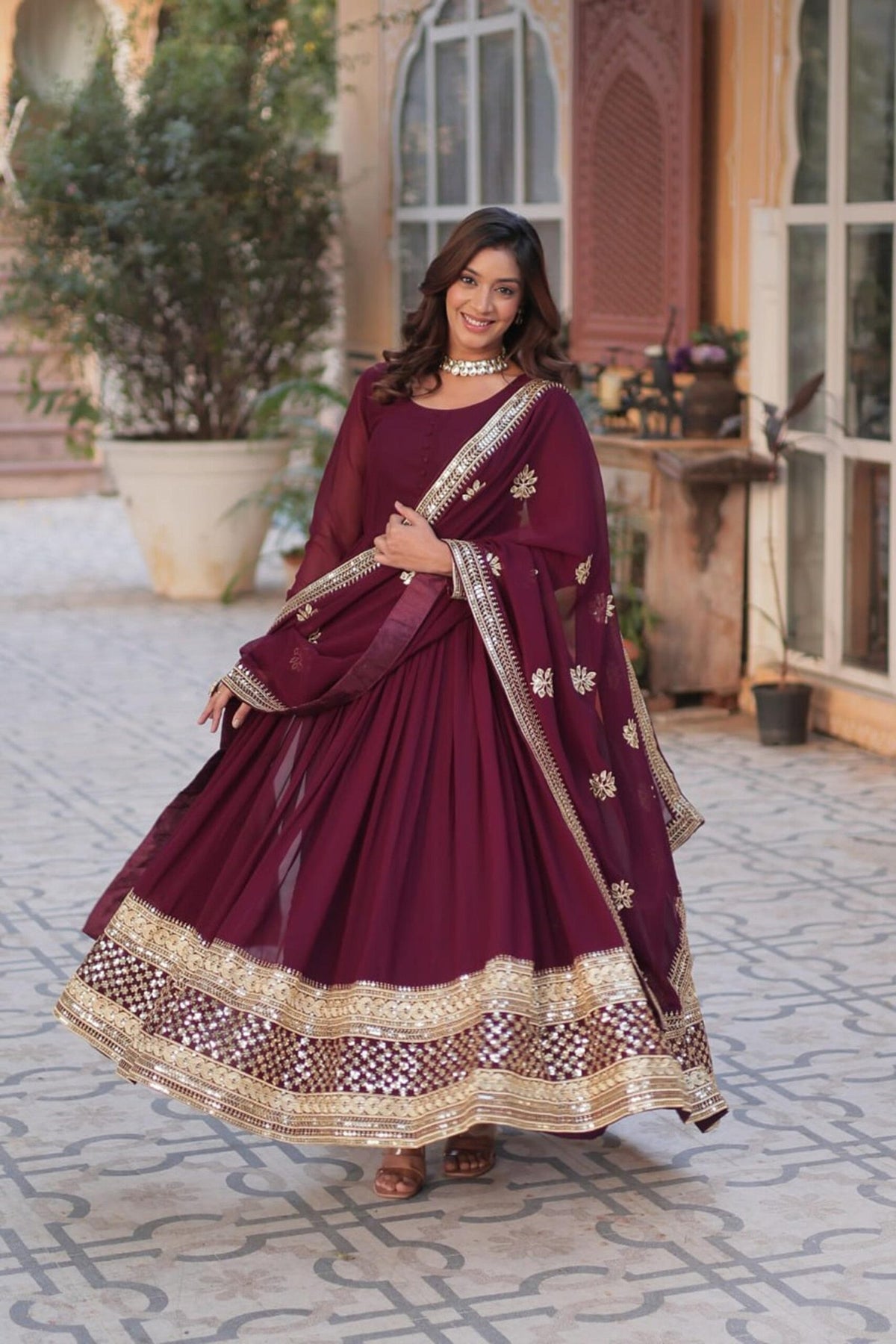 Sophisticated Maroon Zari Sequins Embroidered Gown