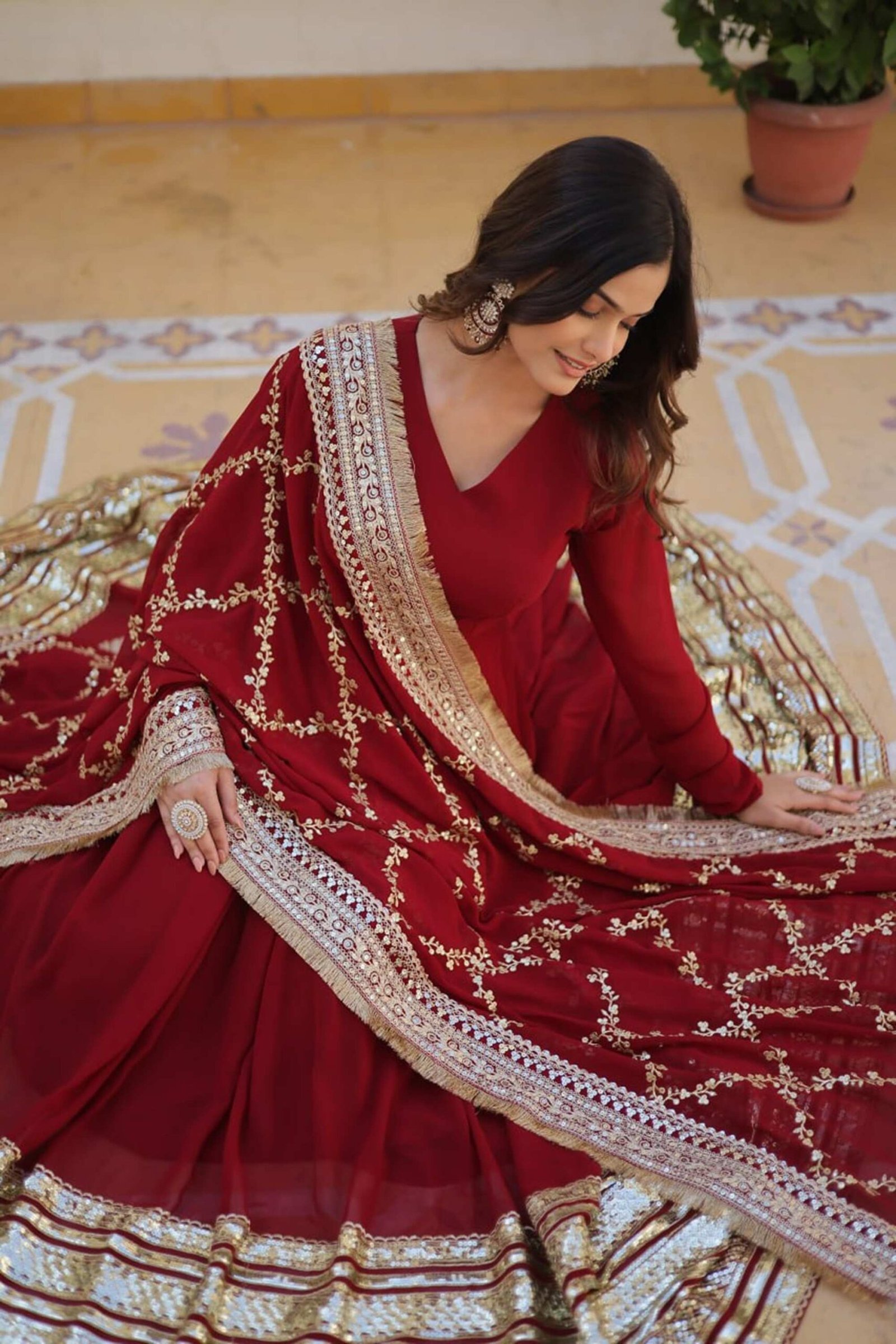 Luxurious Maroon Heavy Designer Gown with Dupatta Luxurious Maroon Heavy Designer Gown with Dupatta