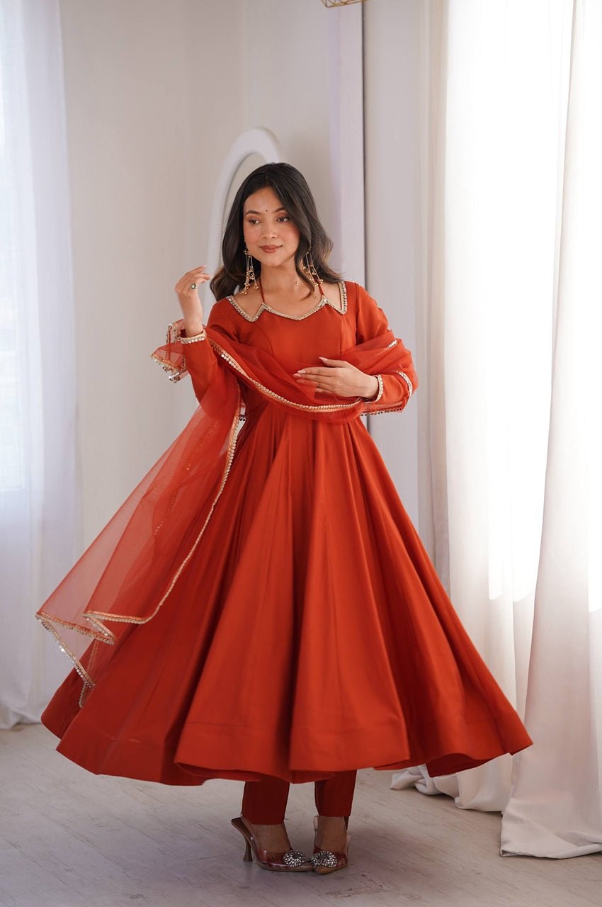 Rust Orange Roman Silk Chanderi Anarkali Suit with 4+ Meter Flair Rust Orange Roman Silk Chanderi Anarkali Suit with 4+ Meter Flair