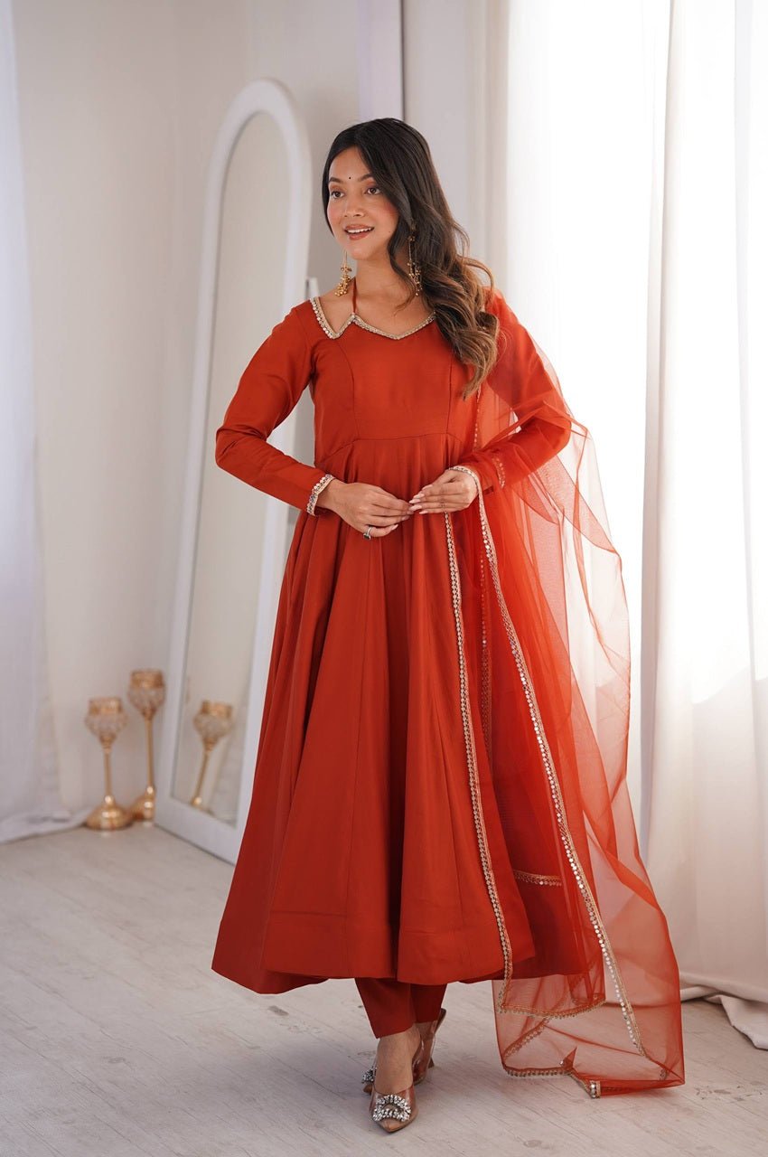 Rust Orange Roman Silk Chanderi Anarkali Suit with 4+ Meter Flair Rust Orange Roman Silk Chanderi Anarkali Suit with 4+ Meter Flair