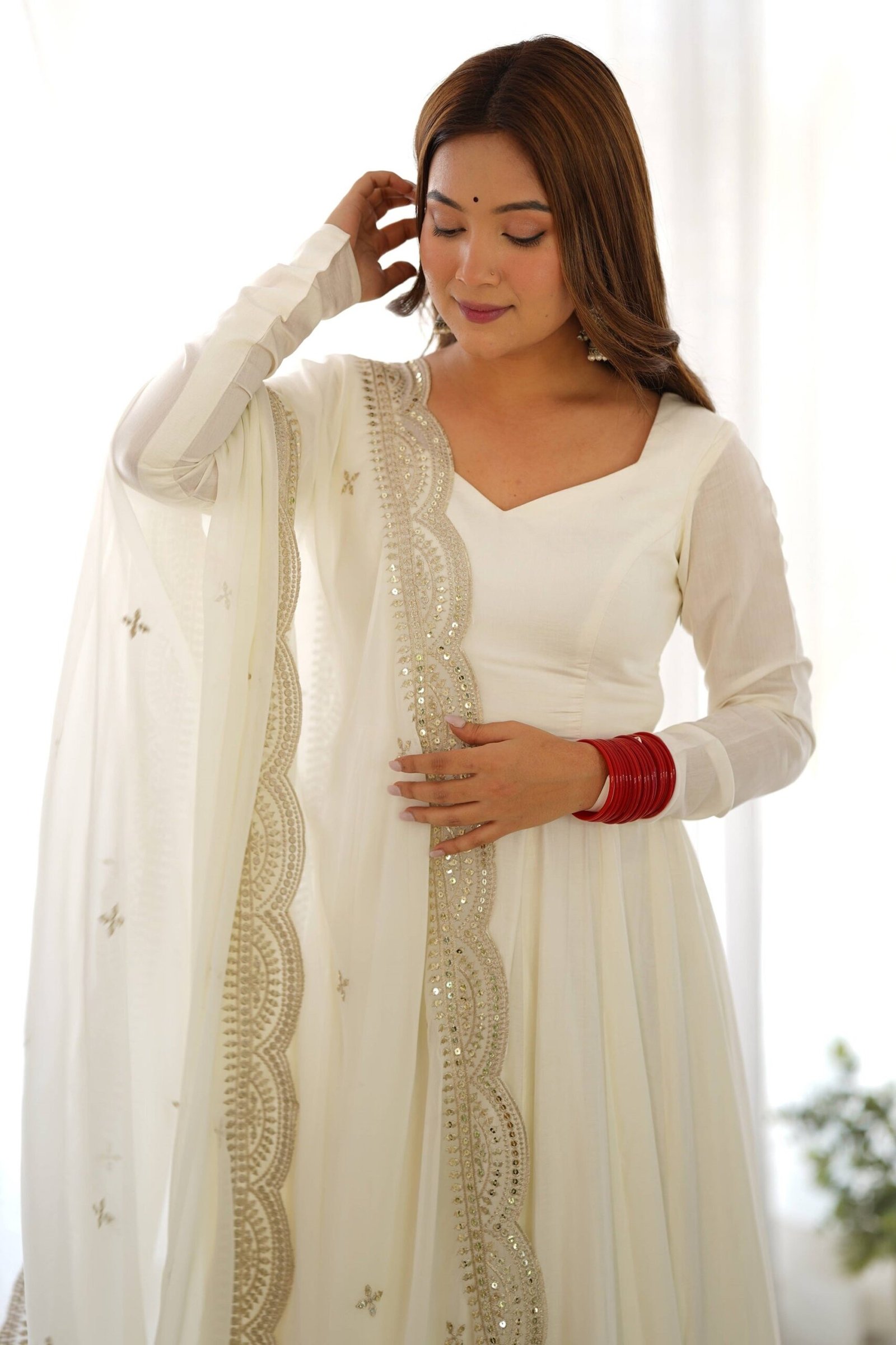 Exquisite White Heavy Pure Romansilk Anarkali Suit with Embroidery Sequence Dupatta Exquisite White Heavy Pure Romansilk Anarkali Suit with Embroidery Sequence Dupatta