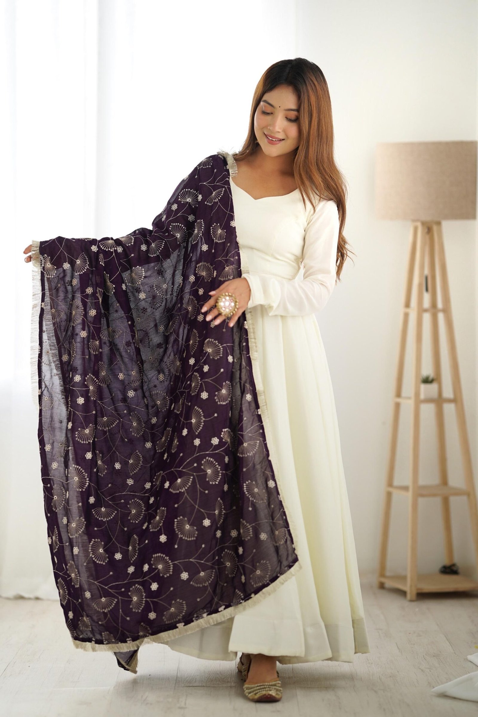 White Silk Anarkali Gown with Purple Heavy Embroidered Dupatta White Silk Anarkali Gown with Purple Heavy Embroidered Dupatta