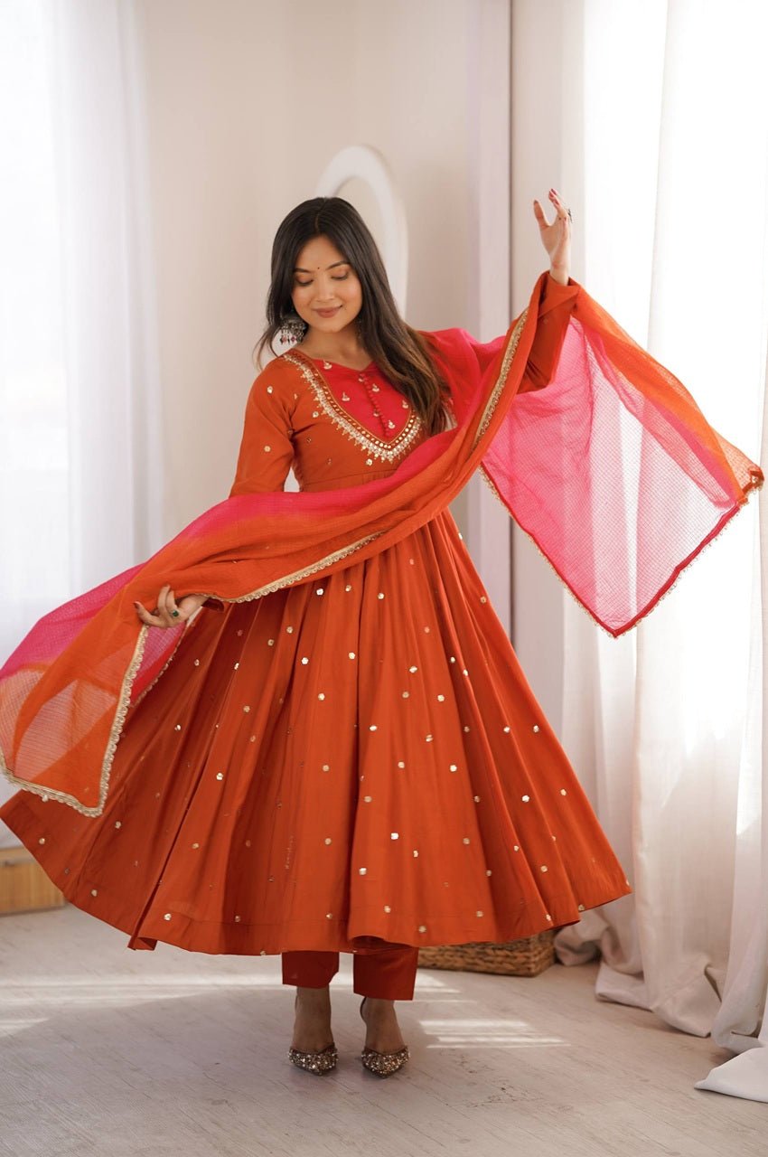 Rust Orange Roman Silk Embroidered Gown Set with Real Mirror Work & Dupatta Rust Orange Roman Silk Embroidered Gown Set with Real Mirror Work & Dupatta