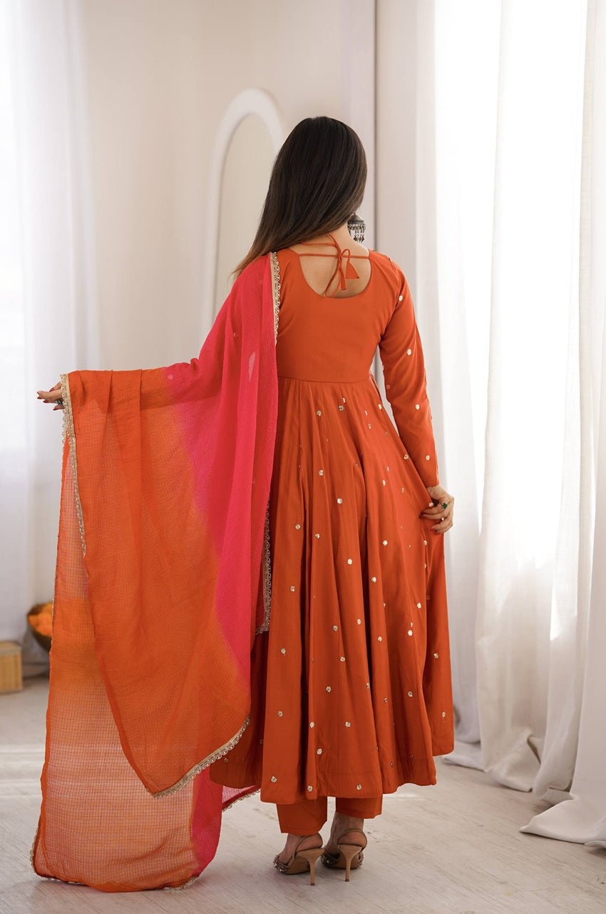 Rust Orange Roman Silk Embroidered Gown Set with Real Mirror Work & Dupatta Rust Orange Roman Silk Embroidered Gown Set with Real Mirror Work & Dupatta